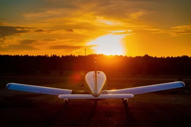 Cessna 172 on the ramp at sunset